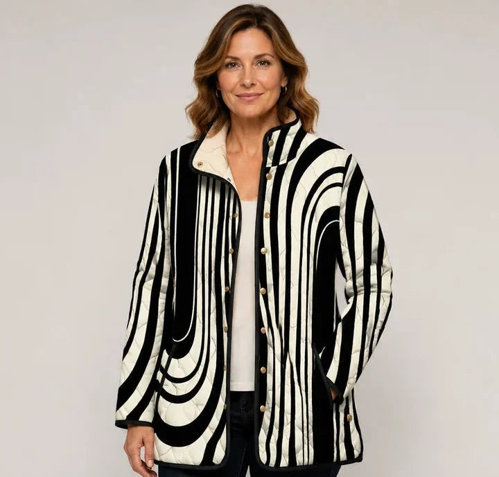 EMMA Vanamo quilted jacket in monochrome wave print, worn by a model